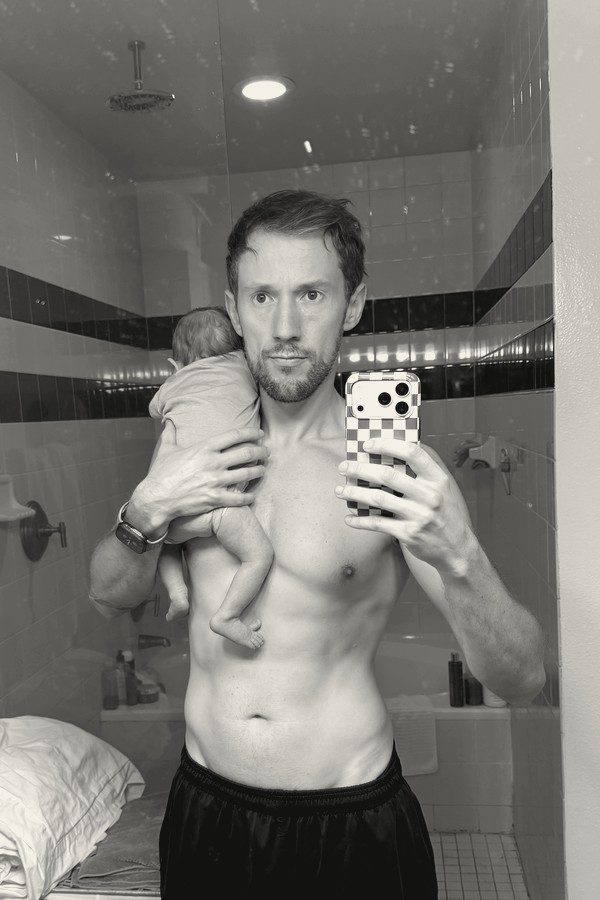 July 2026, 152.6 lb, holding my newborn daughter
